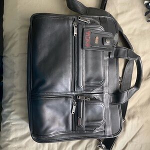 TUMI Sleek Black Leather Briefcase